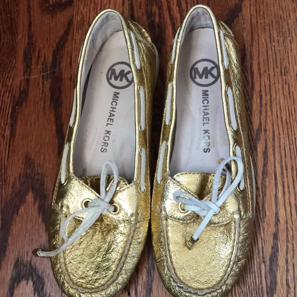 Michael Kors gold loafers